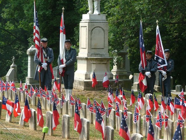 Confederate Flags And Soldiers Graves